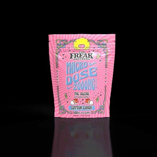 Freak Brothers Micro Dose Cotton Candy 2000mg THC blend gummy packaging on a black background.
