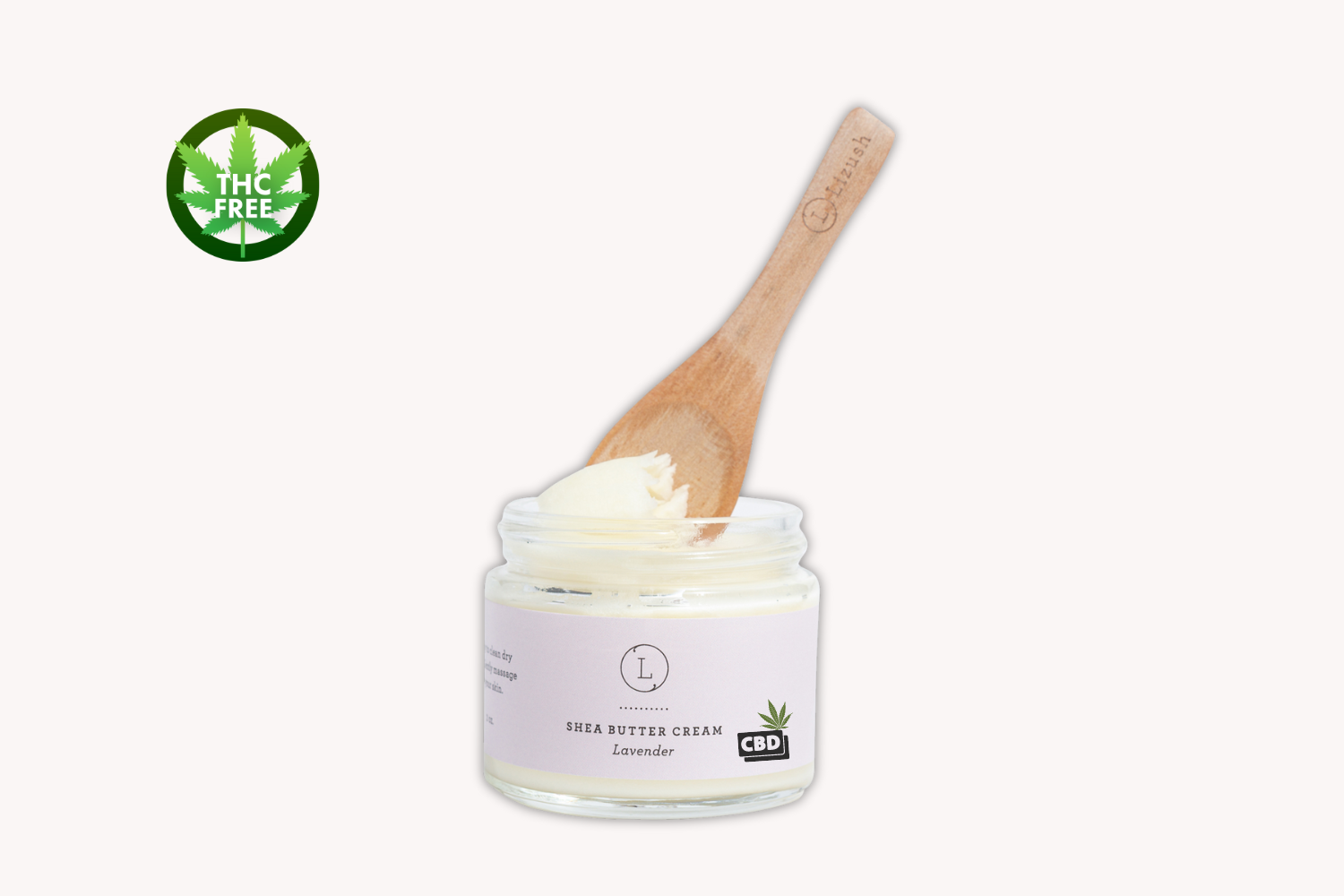 CBD Lavender Shea Butter cream in jar with wooden spoon, THC free body moisturizer for dry skin.