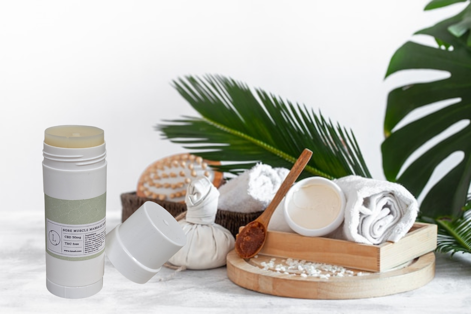CBD Muscle Rescue Balm on a spa-like backdrop with natural elements for soothing sore muscles.