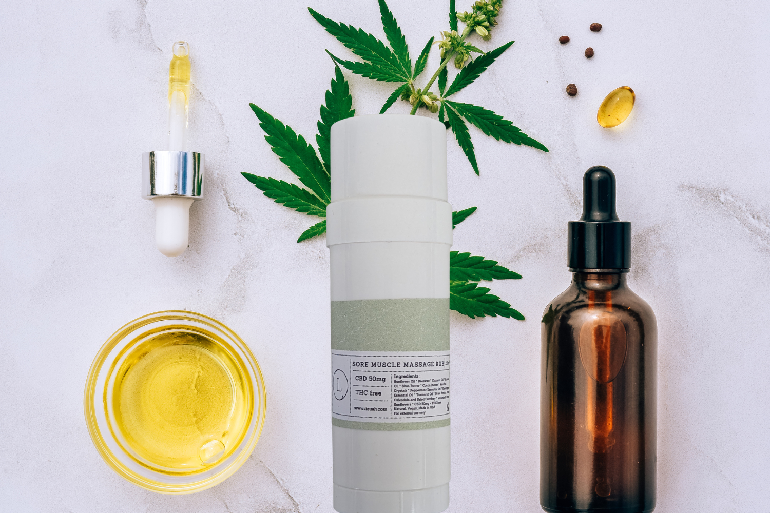 CBD Muscle Rescue Balm with nourishing oils, infused with arnica and turmeric, surrounded by hemp leaves and oils.