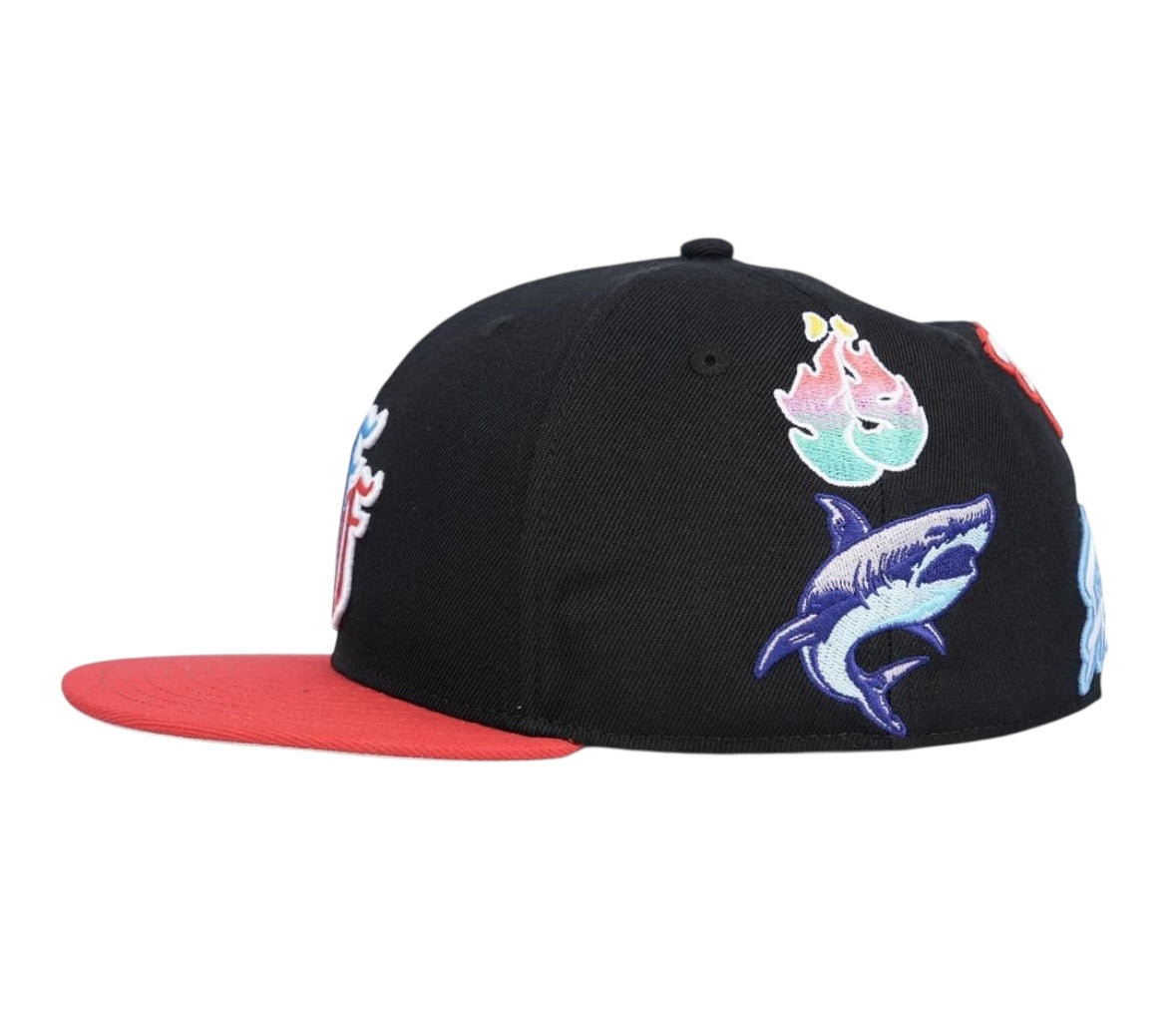 Fitted hat featuring embroidered designs, including flames and a shark, from FOEVER FROSTIEZ X RUNTZ limited edition.